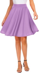 A woman from the waist down, twirling a lavendar skirt that barely reaches her knees